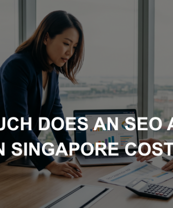 Singapore business professionals reviewing data charts on a laptop in an office overlooking the city skyline.